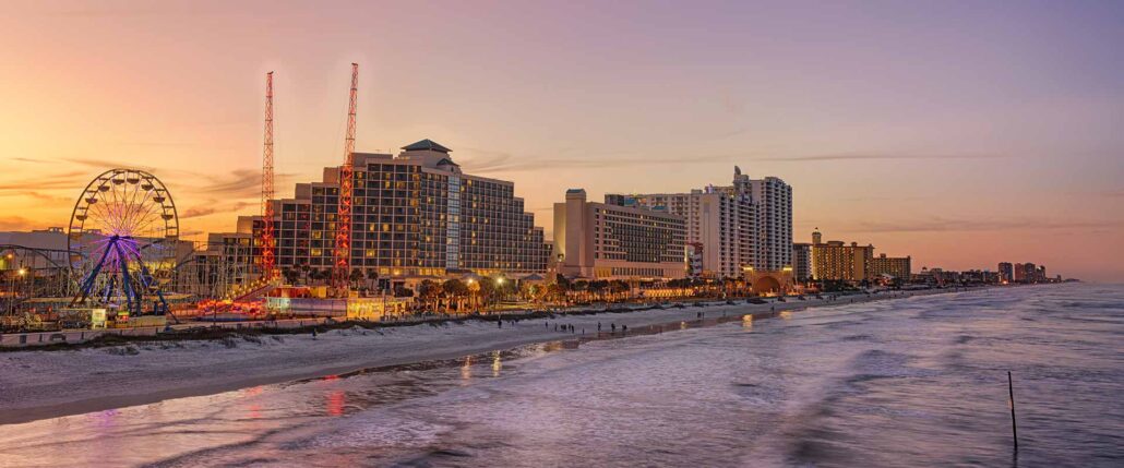 Daytona Beach oceanfront and boardwalk at sunset
